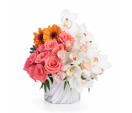 Cymbidium Orchids, Roses and Gerbera Daisies.